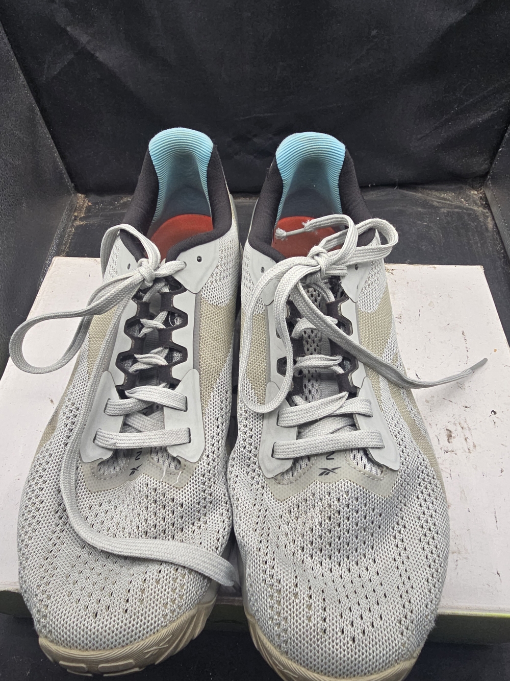 Reebok Men's Light Gray and Black Athletic‎ Training Sneakers with Blue Liner